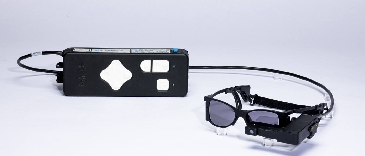 Blind patients read again with smart glasses-linked eye implant